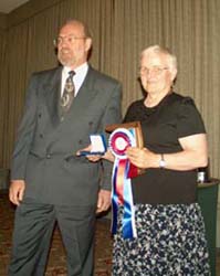Tim Henderson presenting the Best of Show Award to Dorte Brace